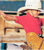 Gril riding a horse.