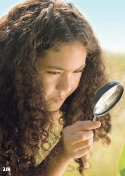 girl with magnifying glass