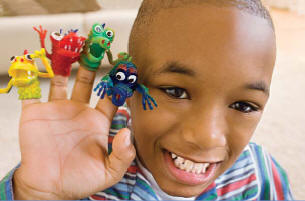 Boy with finger puppets.