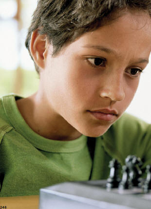 Boy playing chess.